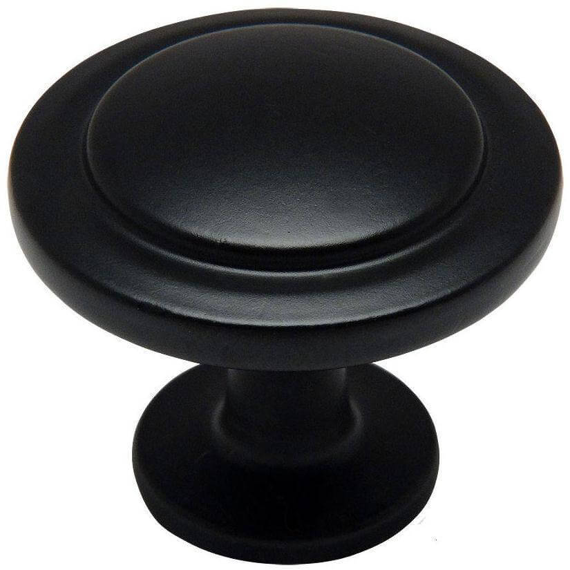 Flat black drawer knob with circle carving and one and a quarter inch diameter